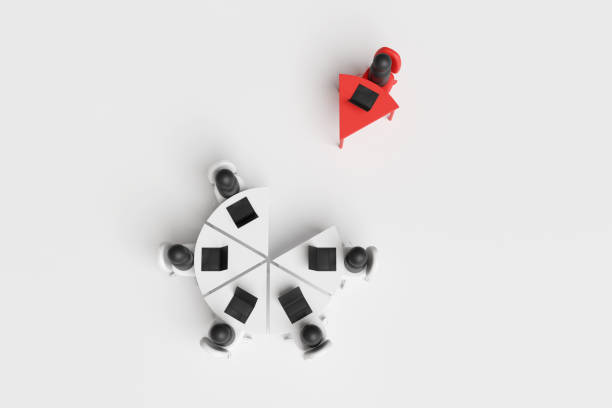 Group of office employees working at a round pie chart shaped table with a single desk being isolated. Illustration of the concept of workplace bullying and lack of teamwork