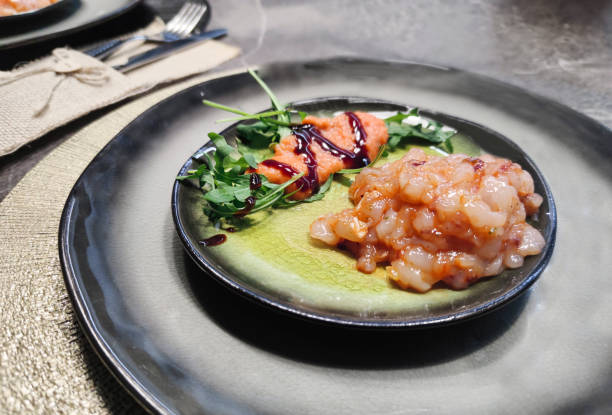istock Orange gazpacho paired with prawn tartare 1922140212