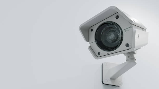 istock CCTV camera on white background. Scan the area for surveillance purposes. Can be used background in security work. 1922143909
