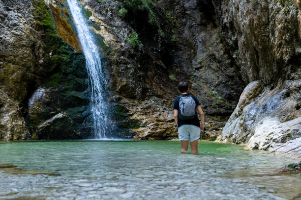 istock Tenager on a hiking trip in the mountains. 1922168811