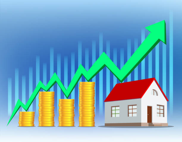 istock Real estate concept. Stacks of money and house 1922258385