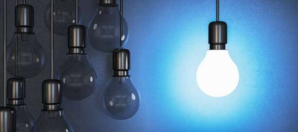 istock Creative numerous glowing lamps on blue wall wallpaper. Idea and innovation, leadership and follow concept. 3D Rendering. 1922266997
