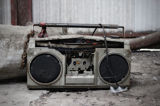 An old boombox on the floor of a factory in Seattle