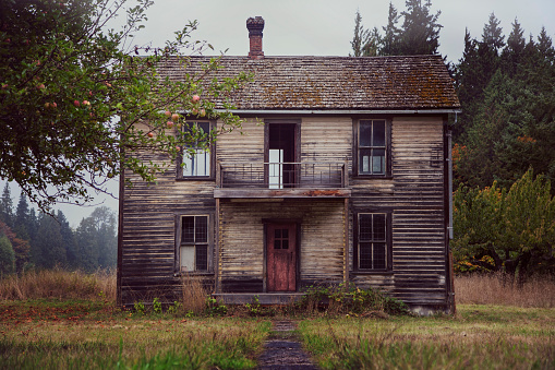 A beautiful fall scene of an abandoned house