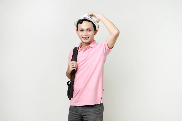Asian man backpacker portrait. digital nomad and travelling concept. on isolated background