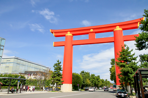 Kyoto, Japan - April 10, 2010: Huge Red Torii Gate marks approach to the Heian-Jingu Shrine