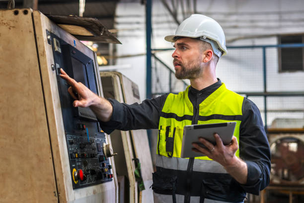istock engineer look projects and planning with tablet mobile in factory 1922319779