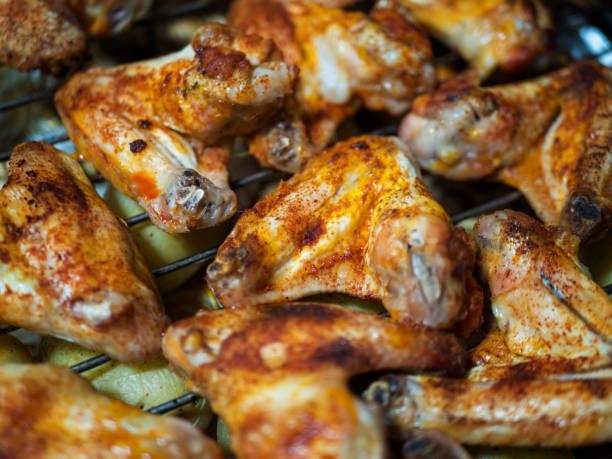 istock Delicious Roasted Chicken Wings on the Grill 1922319825