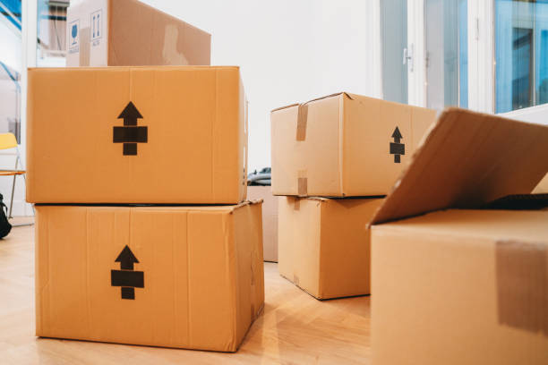istock New apartment with many cardboard boxes during the relocation 1922335634