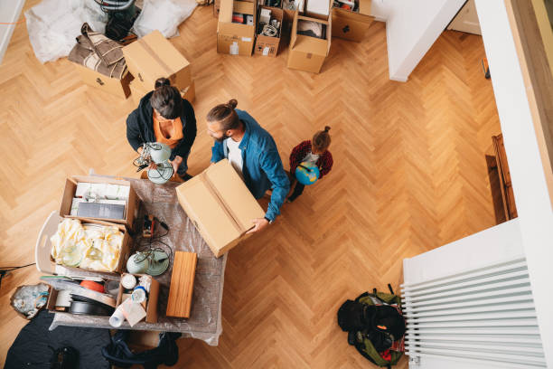 istock A family is unpacking boxes during the relocation into their new apartment 1922335687