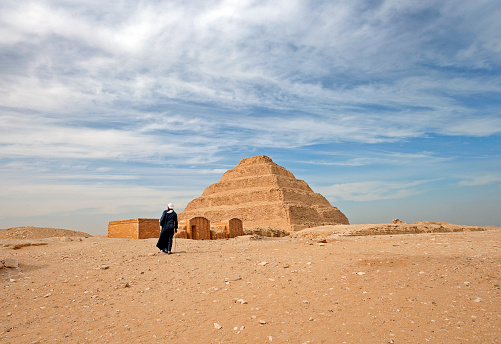 The Step Pyramid of Djoser, Saqqara necropolis, northwest of Memphis, Egypt. This is the first pyramid ever built. Its 6-tier, 4-sided structure is the earliest colossal stone building in Egypt. The River Nile has always and continues to be a lifeline for Egypt. Trade, communication, agriculture, water and now tourism provide the essential ingredients of life - from the Upper Nile and its cataracts, along its fertile banks to the Lower Nile and Delta. In many ways life has not changed for centuries, with transport often relying on the camel on land and felucca on the river