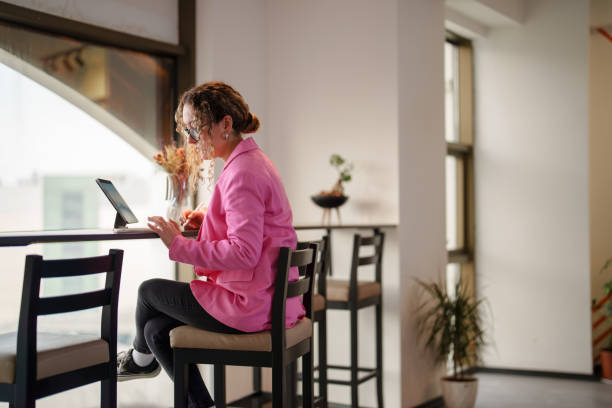 istock Woman working on digital tablet and mobile phone at her office 1922343237