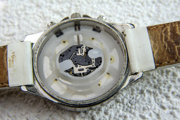 Open used quartz wrist watch on a white