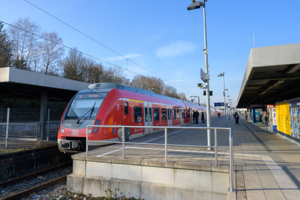 Kirchheim, Germany, January 10 2024: Deutsche Bahn train at the station - S-Bahn at track 2 towards Stuttgart. Red train during rail strike