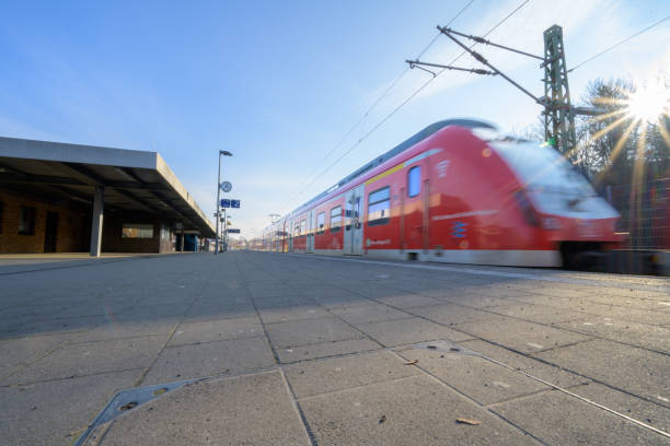 Kirchheim, Germany, January 10 2024: Deutsche Bahn train at the station - S-Bahn at track 2 towards Stuttgart. Red train during rail strike