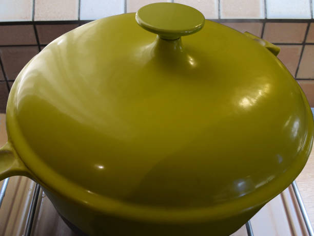 istock Enameled cast iron casserole dish on a hob 1922408014