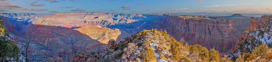 Panoramic image over the Grand Canyon from the South Rim during sunrise in winter