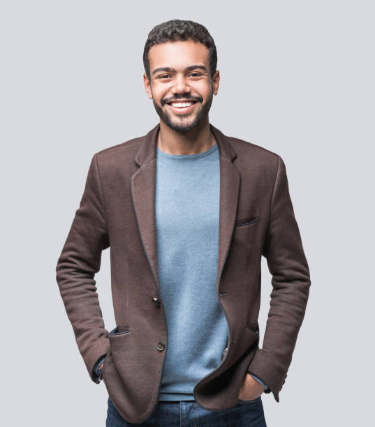 istock Portrait of handsome smiling young man, isolated 1922434233