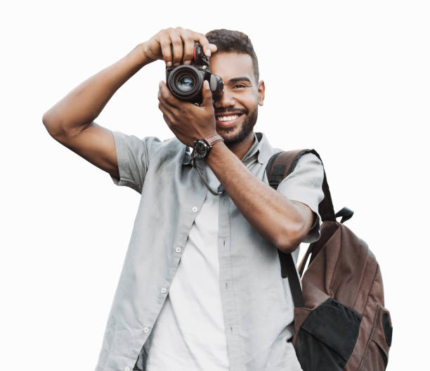 istock Young man photographer with dslr camera taking pictures 1922434248