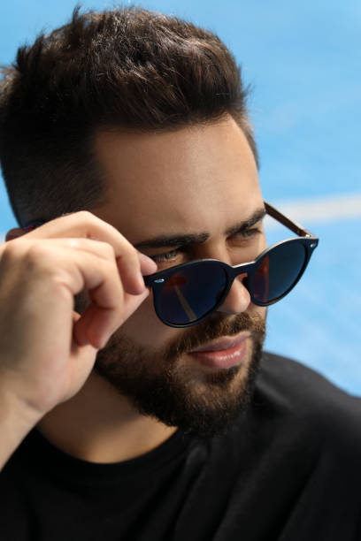 istock Handsome man in sunglasses outdoors on sunny day 1922457584