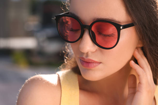 istock Beautiful woman in sunglasses outdoors, closeup. Space for text 1922458630