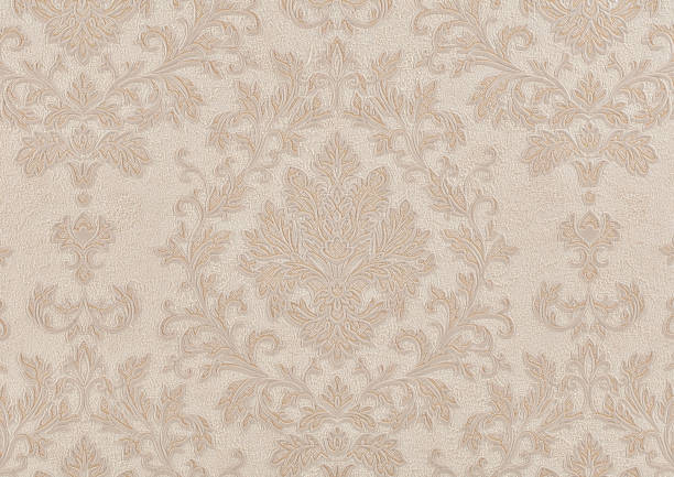 istock Background of light beige paper wallpaper with intertwining floral geometric pattern 1922459823