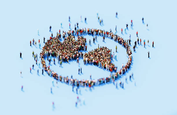 istock Human Crowd Forming World Symbol On Blue Background 1922463355