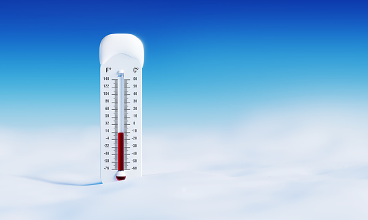 Thermometer on snow. Cold weather concept..