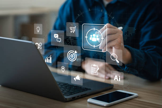 istock Businessman touching on screen to target customer. for buyer persona. customer behavior analysis concept. Marketing plan and strategies. Personalization marketing, customer-centric strategies. 1922473720