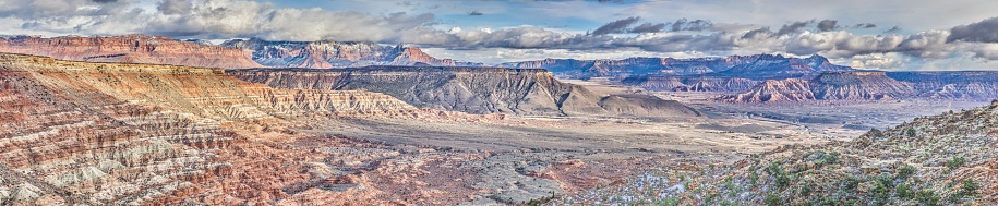 High-contrast panoramic image of the canyon landscape of the Arizona desert during the day