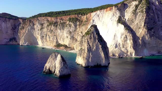 Rocks sticking out of the sea in Zakynthos, Greece. Drone footage. Beautiful views of the Ionian Sea