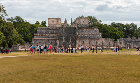 Yucatan, Mexico - November 05 2023: Famous El Castillo pyramid with shadow of serpent at Maya archaeological site of Chichen Itza in Yucatan, Mexico