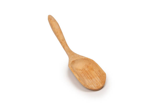 istock Wooden spatula for spices, tea isolated on a white background. 1922590604