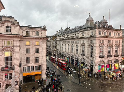 London, UK - 27.12.2023. View from Lillywhites clothing store towards Piccadilly Circus and Piccadilly street. Rainy day in London. Overcast.
