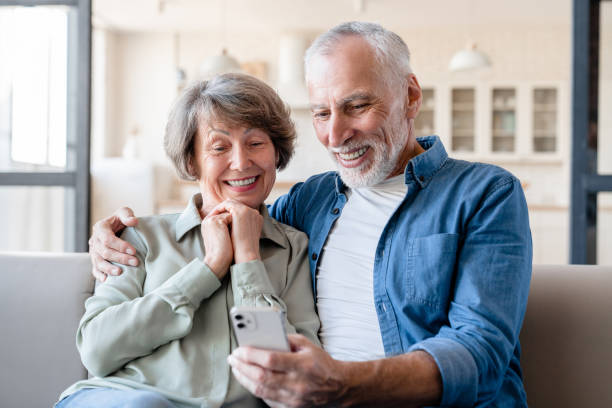 istock Smart grandparents using cellphone for scrolling social media 1922611289
