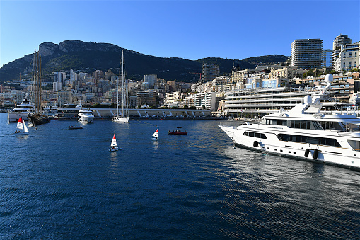 Monaco-ville, Monaco-11 22 2023: Small boats from the sailing course in the marina of Monaco.