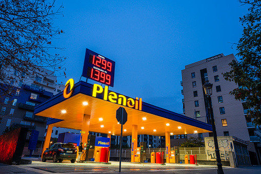 Valencia, Spain January 10, 2024. Plenoil low cost gas station displaying gas prices on a billboard.