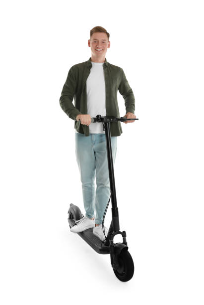 istock Happy man riding modern electric kick scooter on white background 1922628779