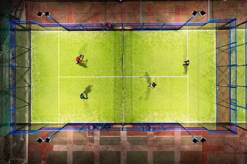 Overhead view of a Padel Tennis match at night