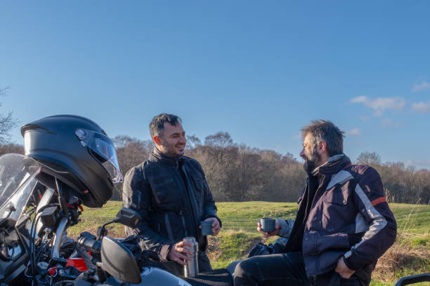 istock Motorbikes and two men having a chat and coffee 1922691662