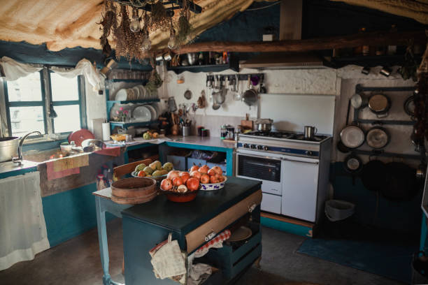 Interior view of a rural kitchen with utensils and food
