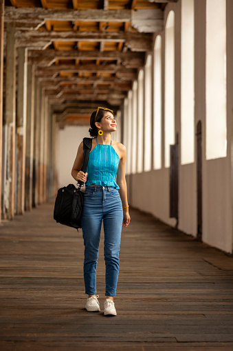 Young woman walking in the corridors