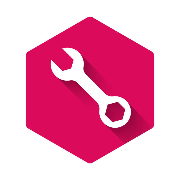 white wrench spanner icon isolated with long shadow. pink hexagon button. vector - hardware store hexagon bolt work tool stock illustrations