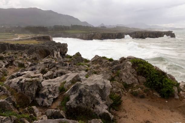 istock Bufones de Pria in Asturias coast on a cloudy day with rough seas and wave spray 1922790889