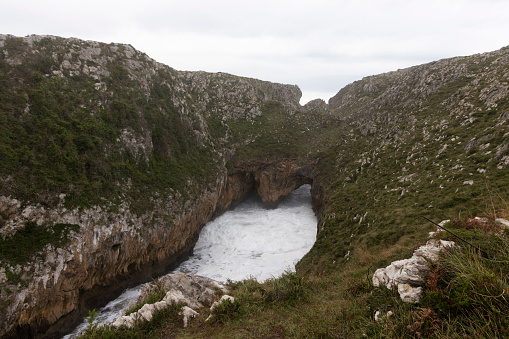 Ocean bay in rock shore with waves at Bufones de Pria in Asturias part of Camino de Santiago