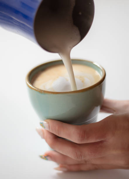 istock A woman is making a latte. 1922839922