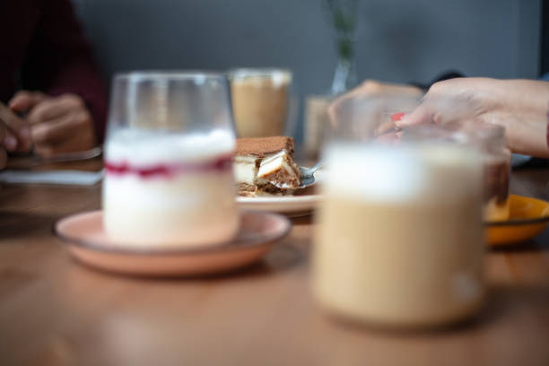 istock People are eating a dessert. 1922881933