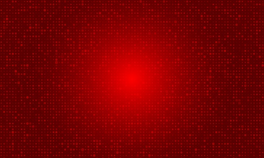 Abstract halftone dots dotted background in red colors.