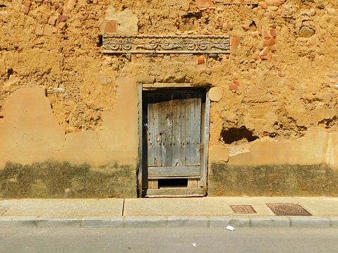ancient door in rural village in Esla-Campos region