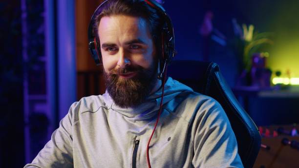 istock Close up shot of pro gamer broadcasting game on internet, talking with audience 1922944335